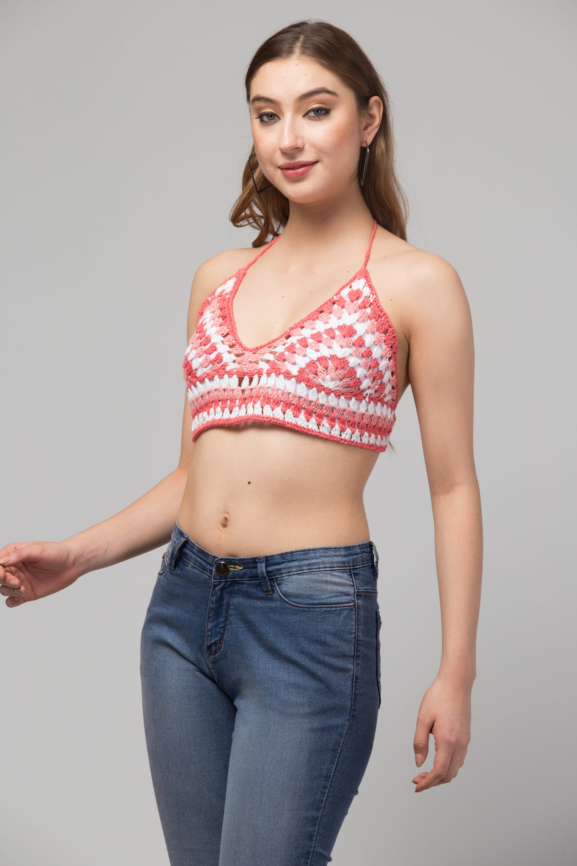 A stylish handmade crochet Rose Crop Top-Bralette in organic green fabric, featuring an abstract design perfect for summer wear.