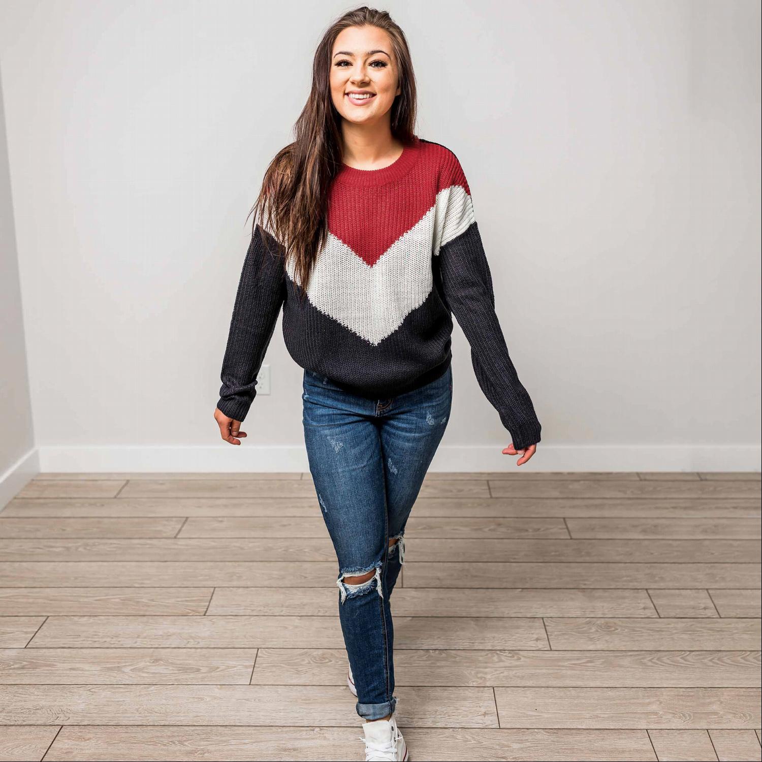 A stylish Round Neck Long Sleeve Chevron Colorblock Sweater featuring a trendy chevron pattern in vibrant colors, perfect for winter wear.