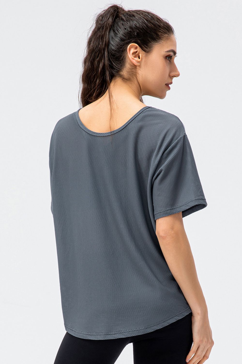 Round Neck Short Sleeve Active Tee in solid color, showcasing its casual style and comfortable fit.