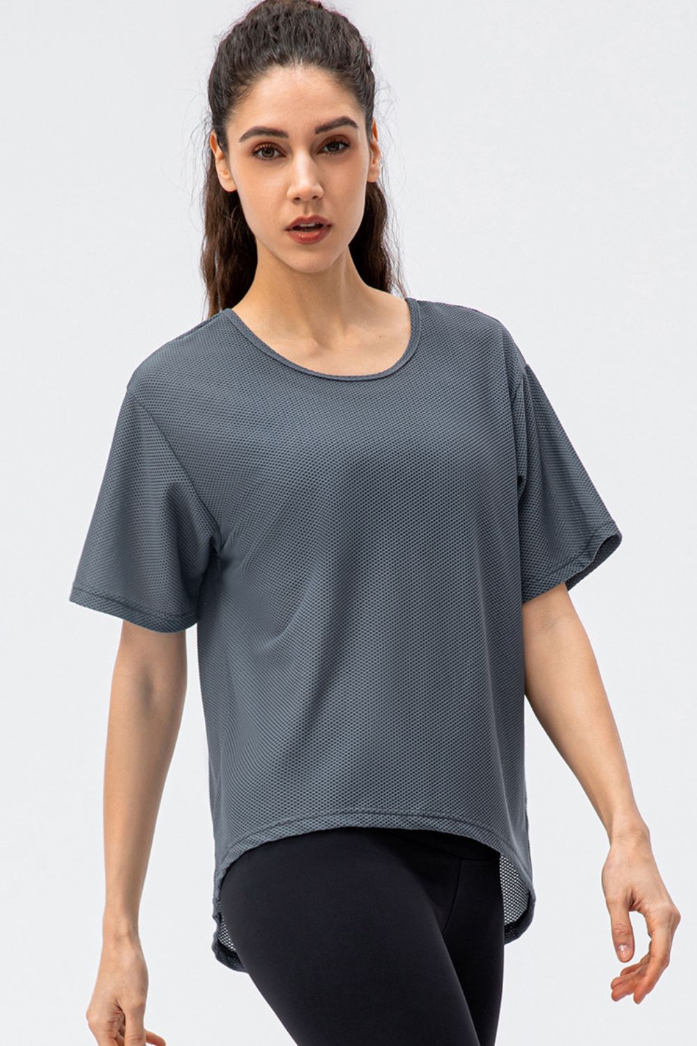 Round Neck Short Sleeve Active Tee in solid color, showcasing its casual style and comfortable fit.