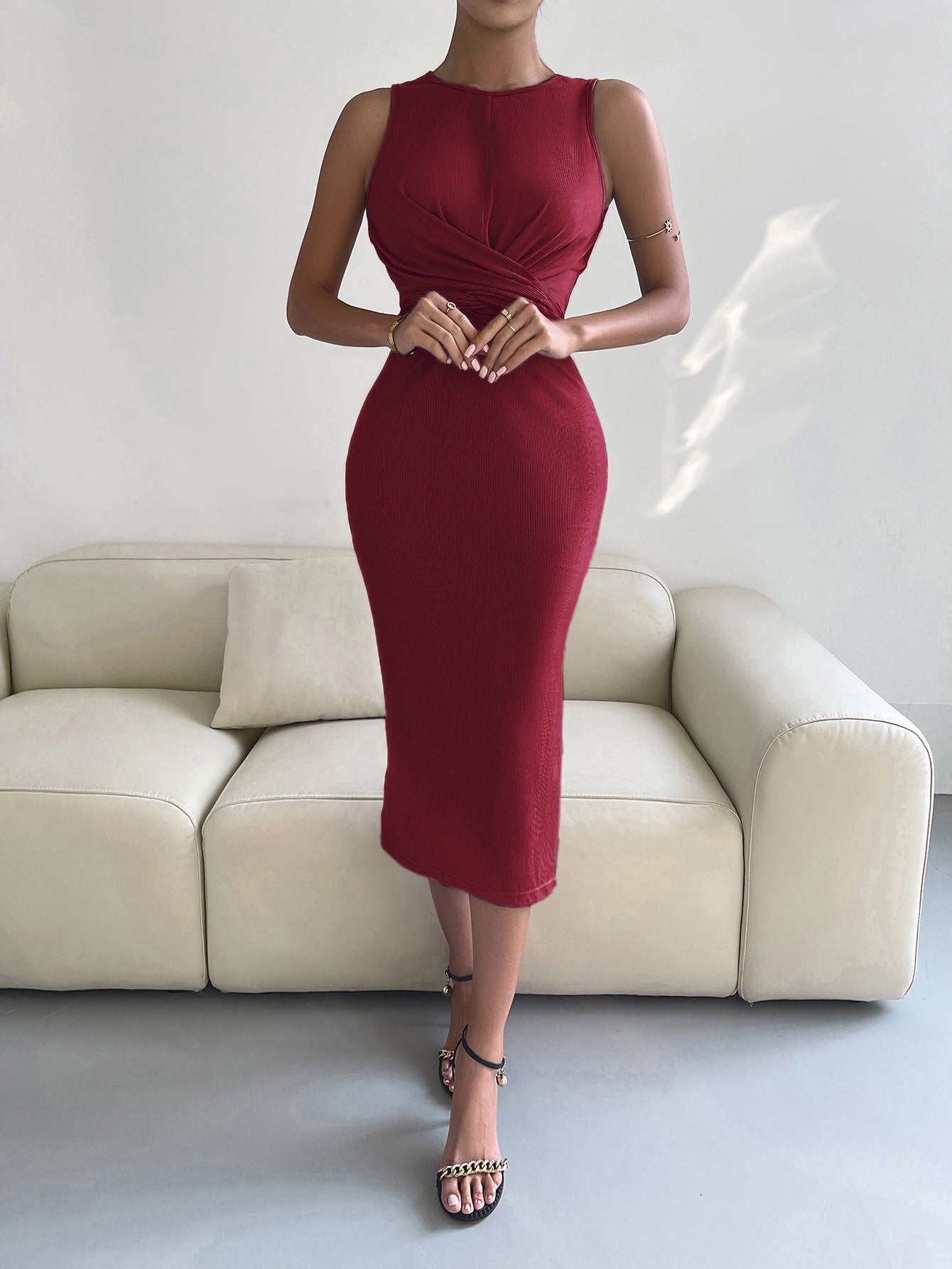 A stylish round neck tie back slit sleeveless dress in solid color, showcasing a chic design and flattering silhouette.