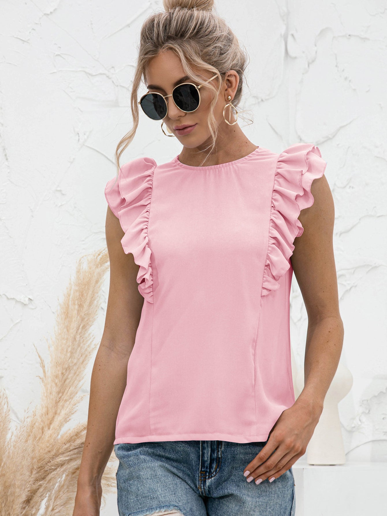 Round Neck Tied Open Back Flutter Sleeve Top in solid color with flutter sleeves and tied back detail.