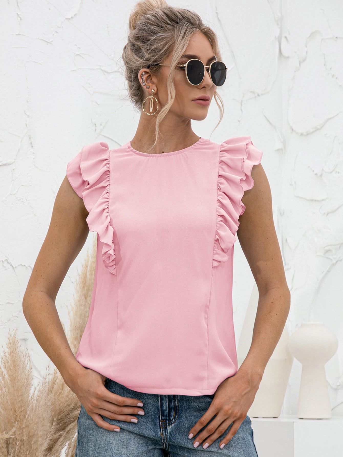 Round Neck Tied Open Back Flutter Sleeve Top in solid color with flutter sleeves and tied back detail.