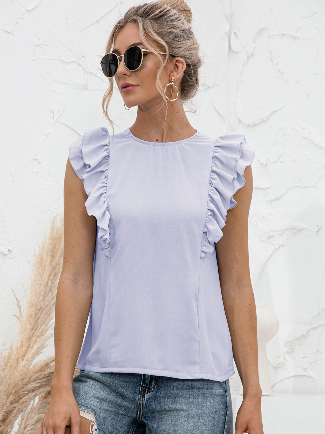 Round Neck Tied Open Back Flutter Sleeve Top in solid color with flutter sleeves and tied back detail.