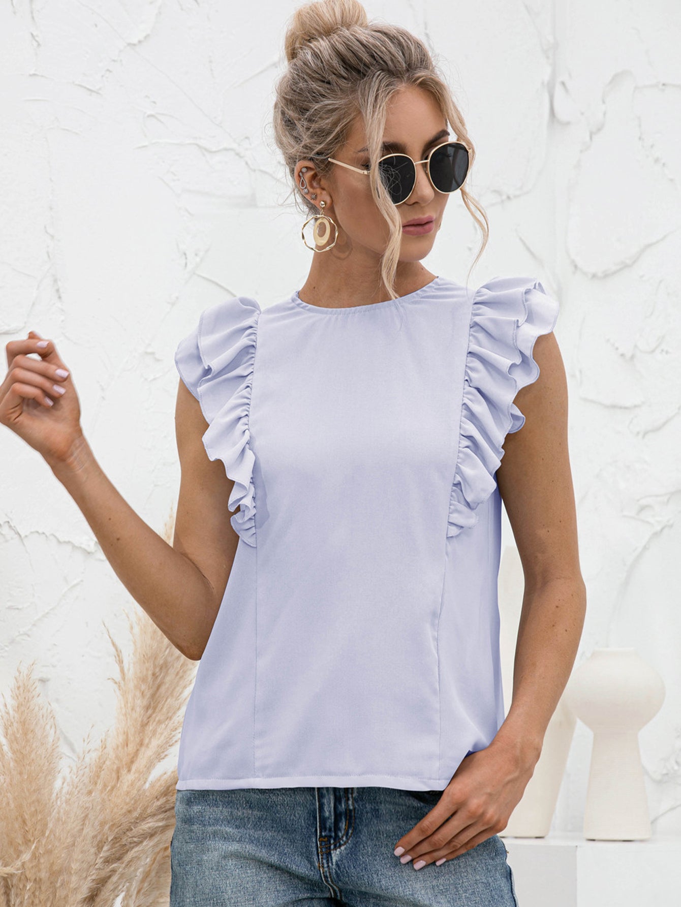 Round Neck Tied Open Back Flutter Sleeve Top in solid color with flutter sleeves and tied back detail.