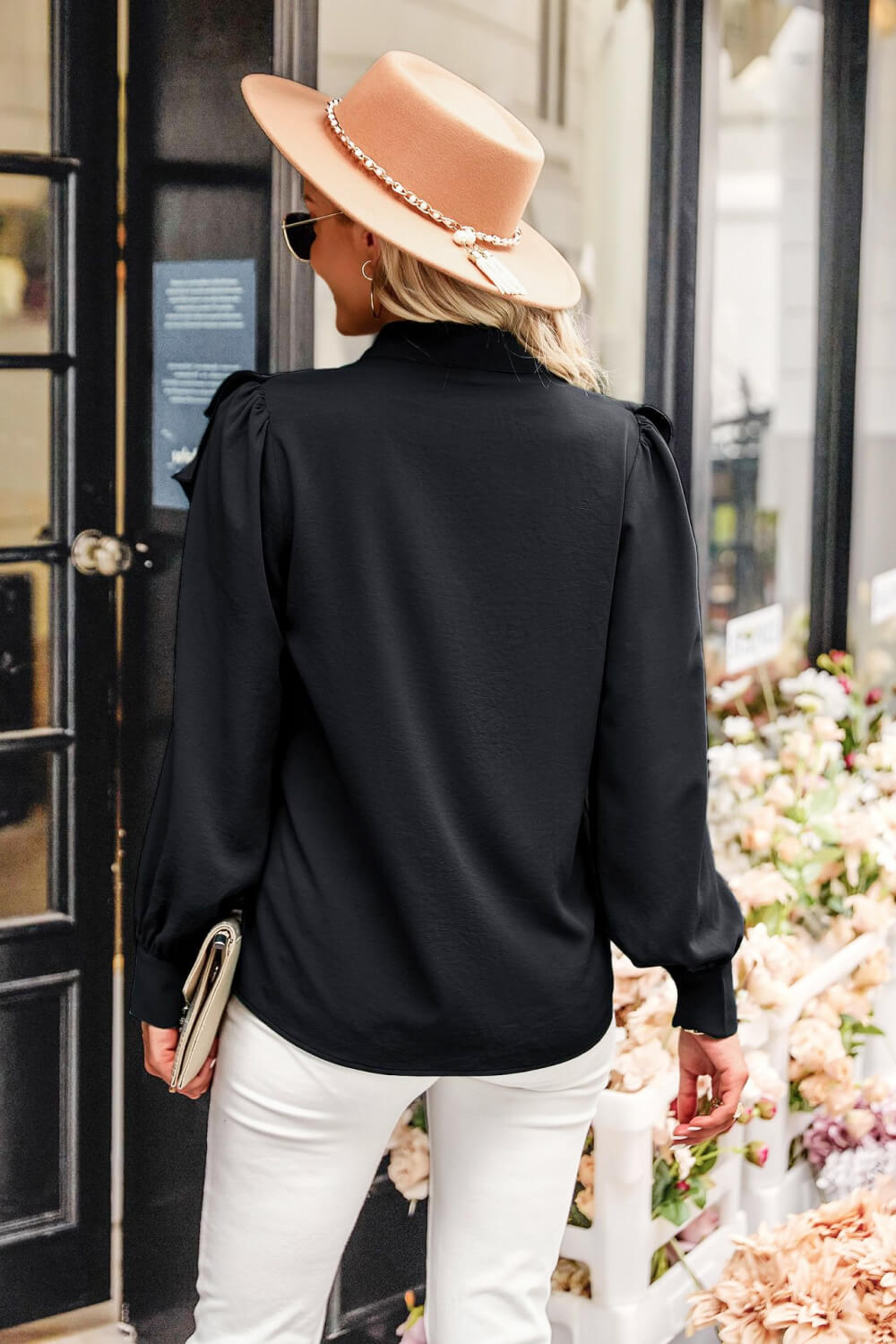 A stylish Ruffled Button-Up Puff Sleeve Blouse featuring layered ruffles, long puff sleeves, and a band collar, perfect for chic outfits.