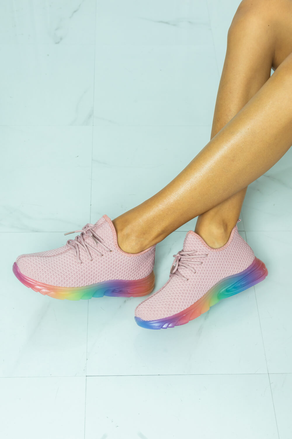 Runner's Delight Color Block Lace-Up Sneaker in Mauve featuring a vibrant rainbow gradient sole and breathable fabric upper.