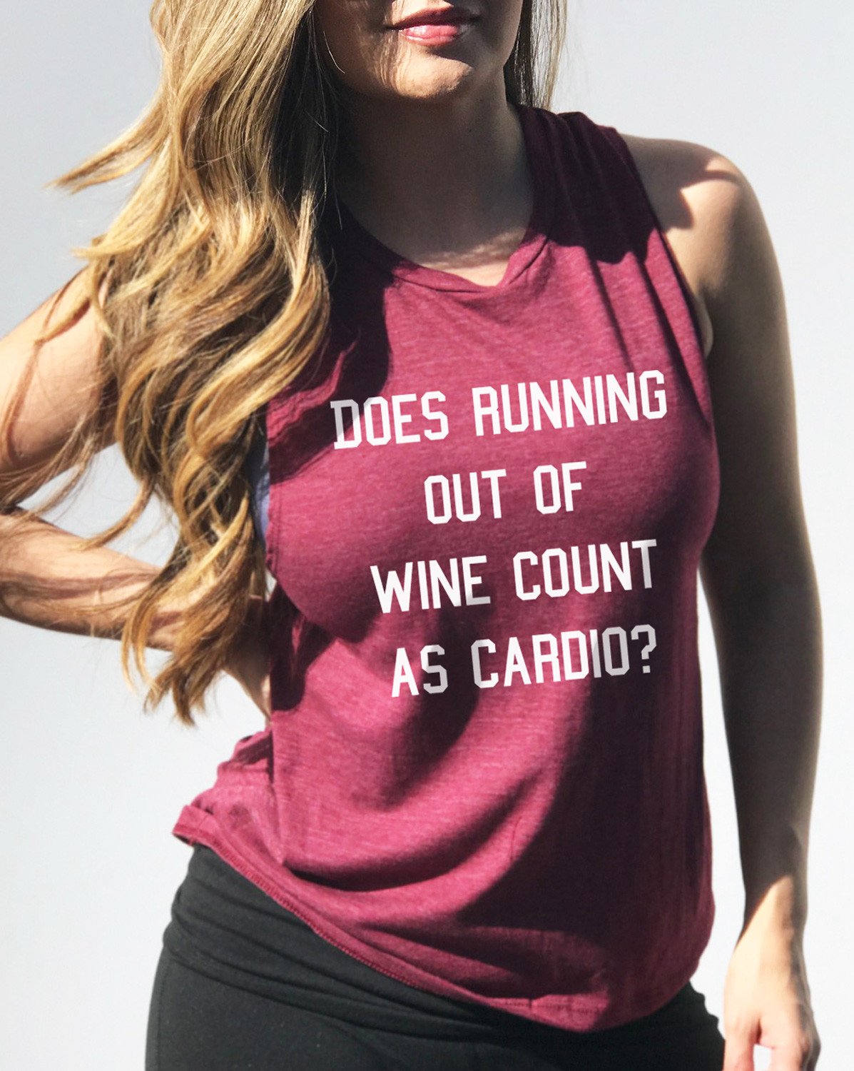 A Merlot Red Heather Muscle Tank Top with a humorous wine-themed graphic that reads 'DOES RUNNING OUT OF WINE COUNT AS CARDIO?'