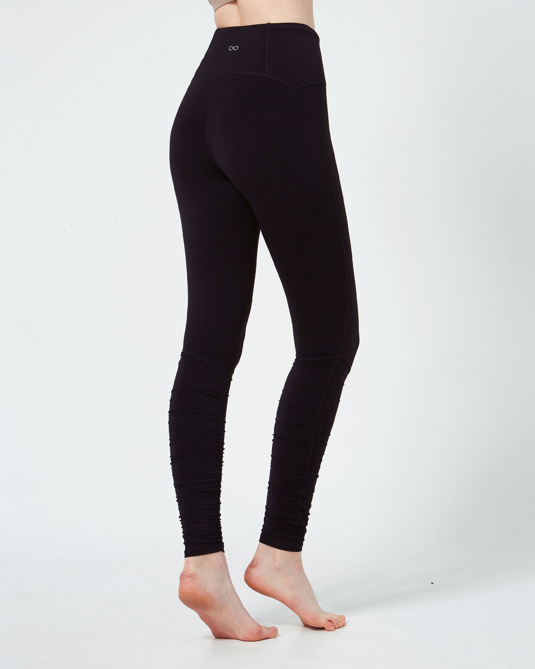 Rusche Hour Coziplex™ Legging featuring back pockets and side seams for a flattering fit, made from 80% Nylon and 20% Spandex.