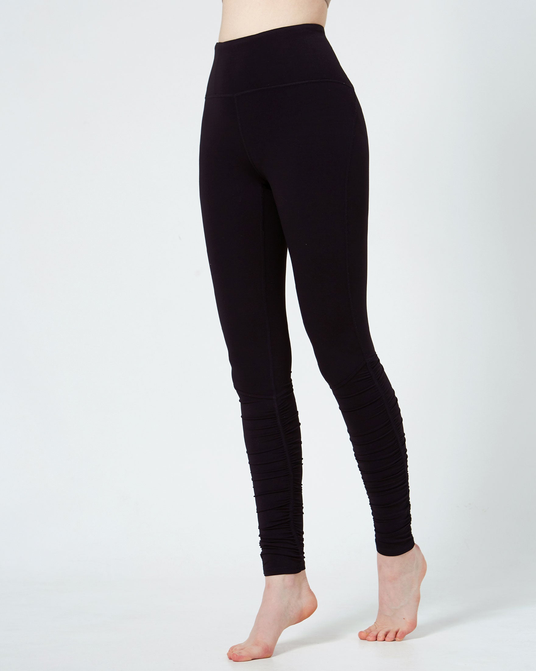 Rusche Hour Coziplex™ Legging featuring back pockets and side seams for a flattering fit, made from 80% Nylon and 20% Spandex.