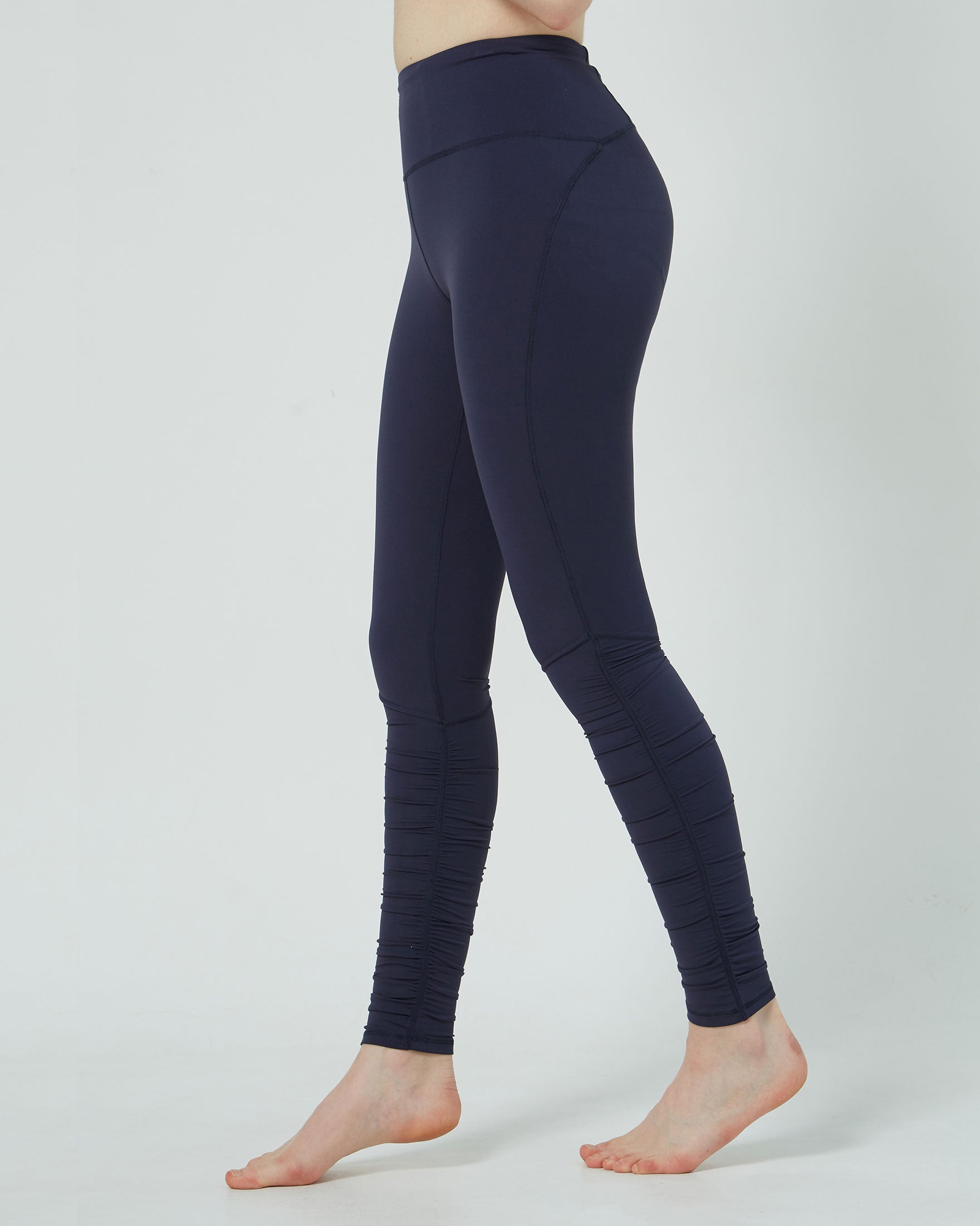 Rusche Hour Coziplex™ Legging featuring back pockets and side seams for a flattering fit, made from 80% Nylon and 20% Spandex.