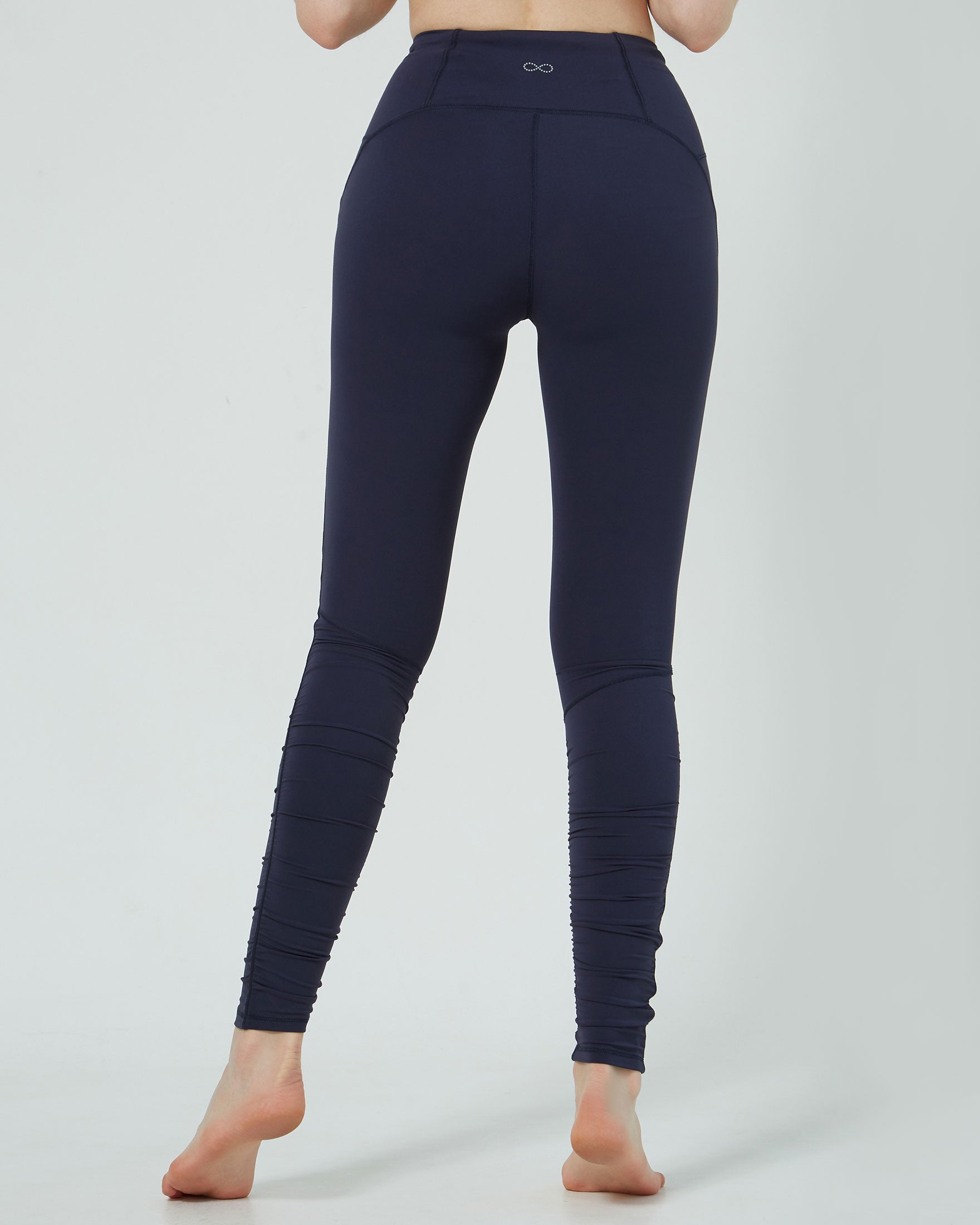 Rusche Hour Coziplex™ Legging featuring back pockets and side seams for a flattering fit, made from 80% Nylon and 20% Spandex.