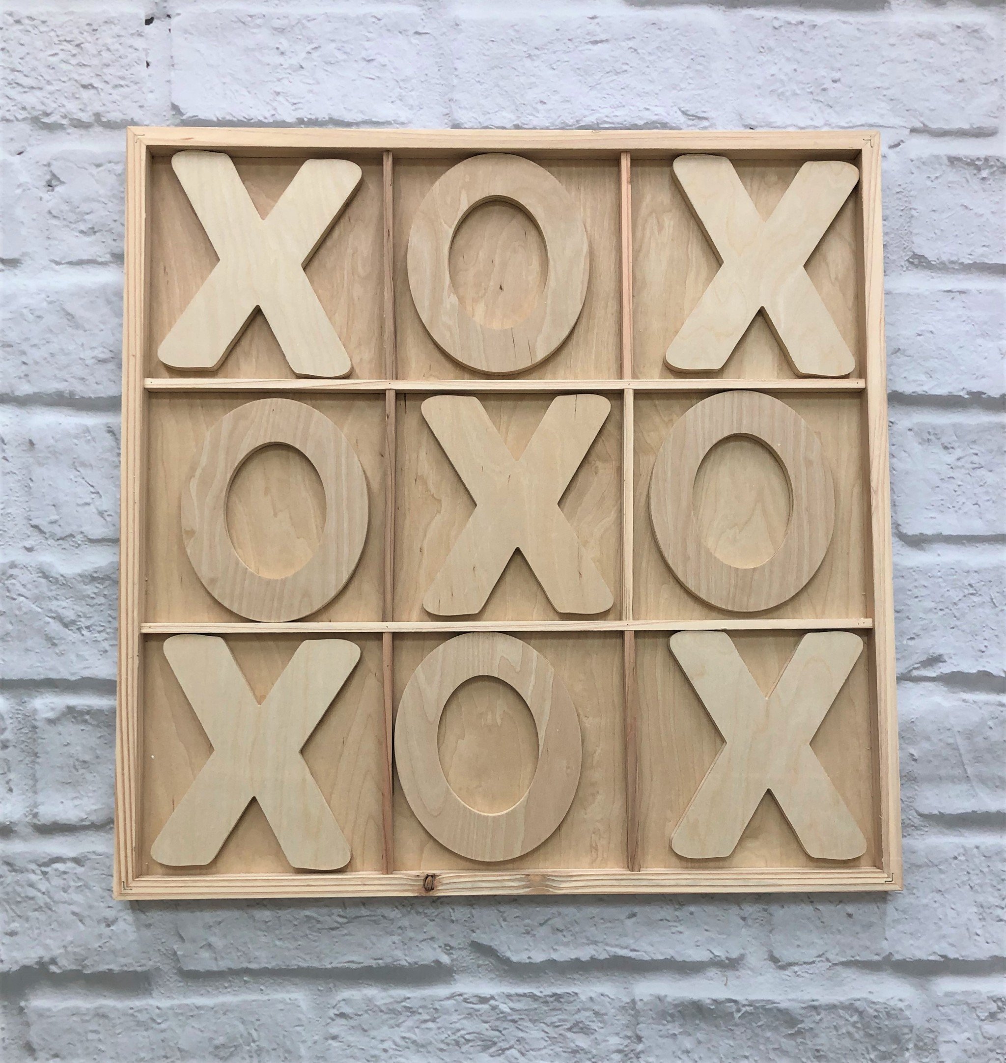 Rustic Handmade Natural Giant Tic Tac Toe game set featuring a wooden board and natural Xs and Os, perfect for indoor and outdoor fun.