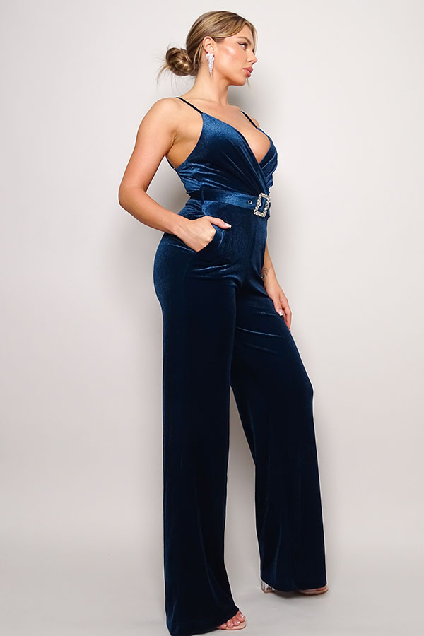 Samba Rhinestone Belt Velvet Jumpsuit in teal with spaghetti straps and rhinestone buckle belt, showcasing a deep V neckline and gathered bust detail.