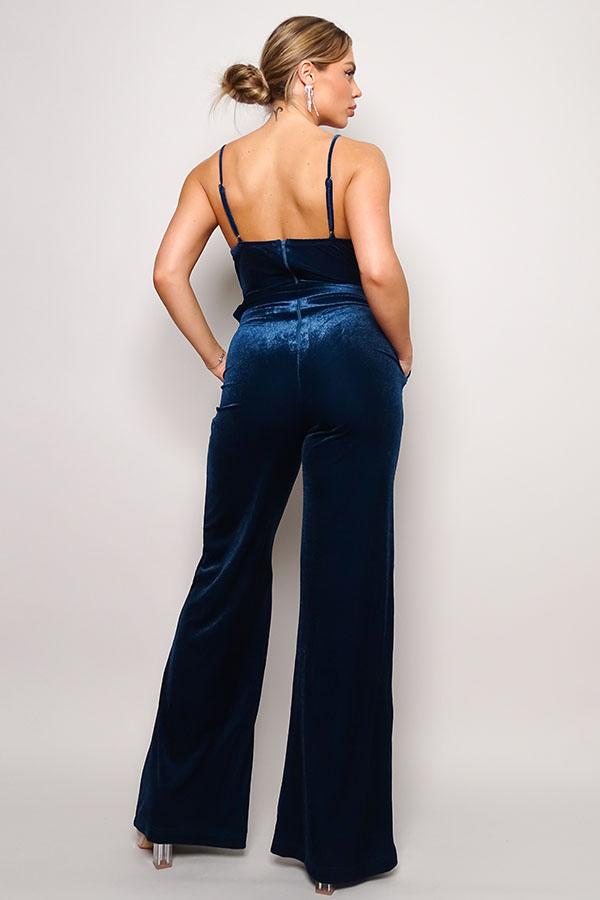 Samba Rhinestone Belt Velvet Jumpsuit in teal with spaghetti straps and rhinestone buckle belt, showcasing a deep V neckline and gathered bust detail.