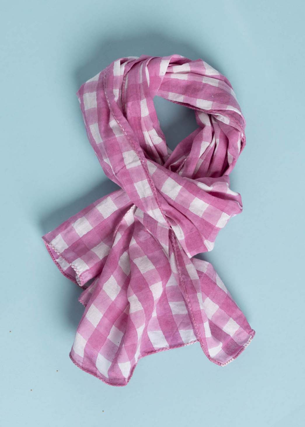 Gingham Picnic Skinny Dahlia scarf made from organic cotton, featuring a unique block print design, perfect for versatile styling.