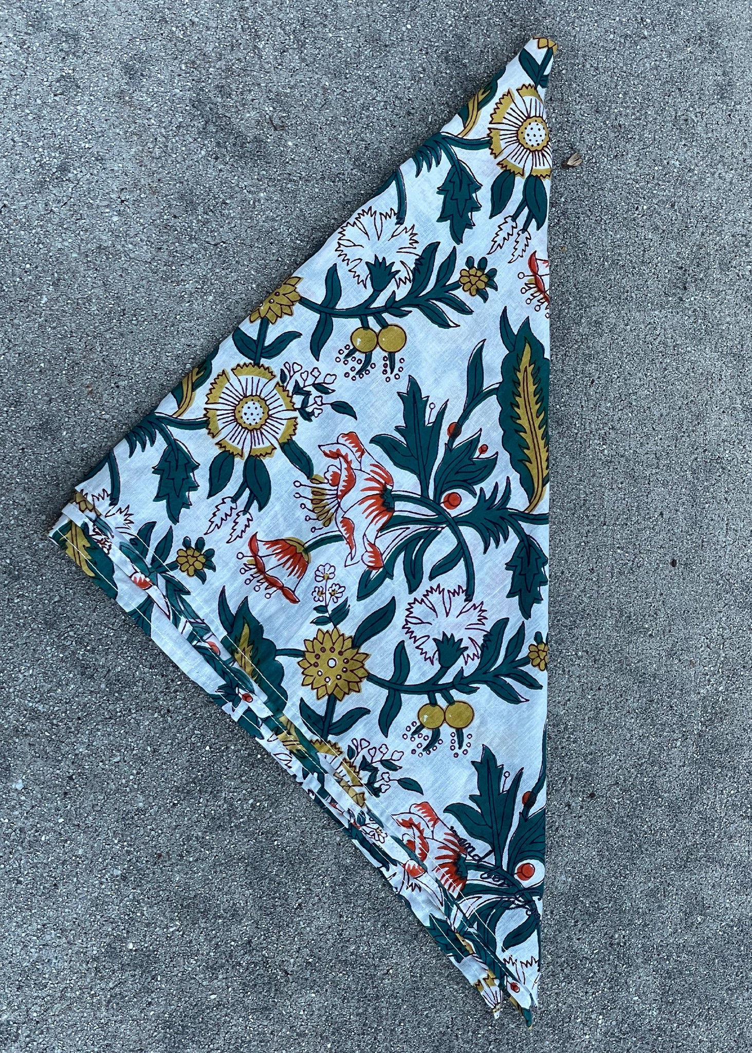 A beautifully crafted Sketch Floral Square Scarf featuring vibrant floral patterns, made from organic cotton, showcasing traditional Indian craftsmanship.