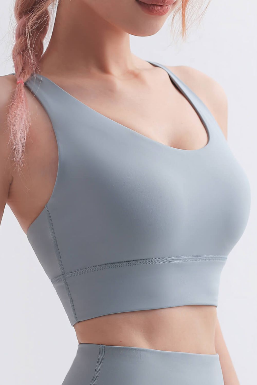 Scoop Neck Crisscross Back Sports Bra in solid color, showcasing its stylish design and comfortable fit, perfect for yoga and workouts.