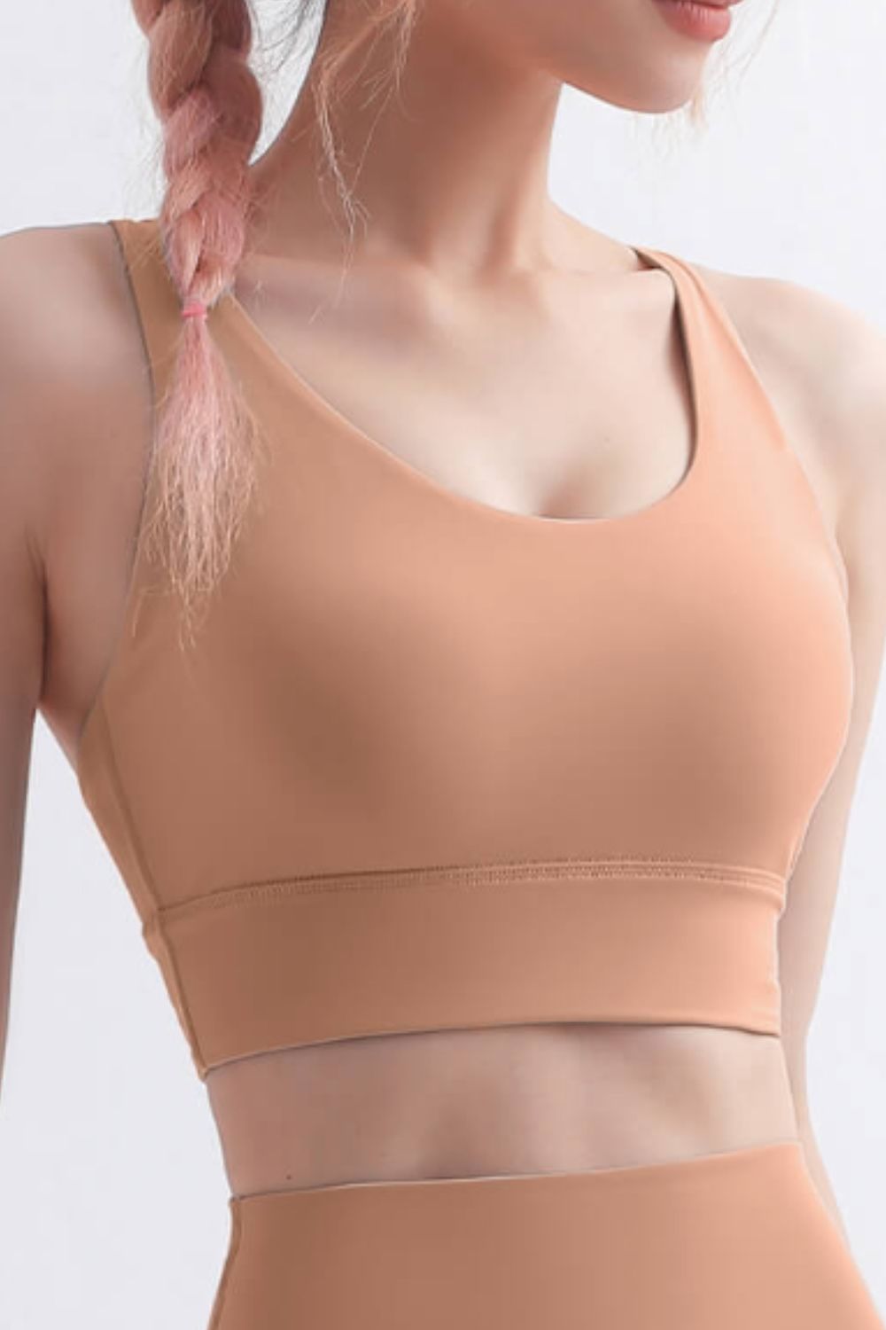 Scoop Neck Crisscross Back Sports Bra in solid color, showcasing its stylish design and comfortable fit, perfect for yoga and workouts.