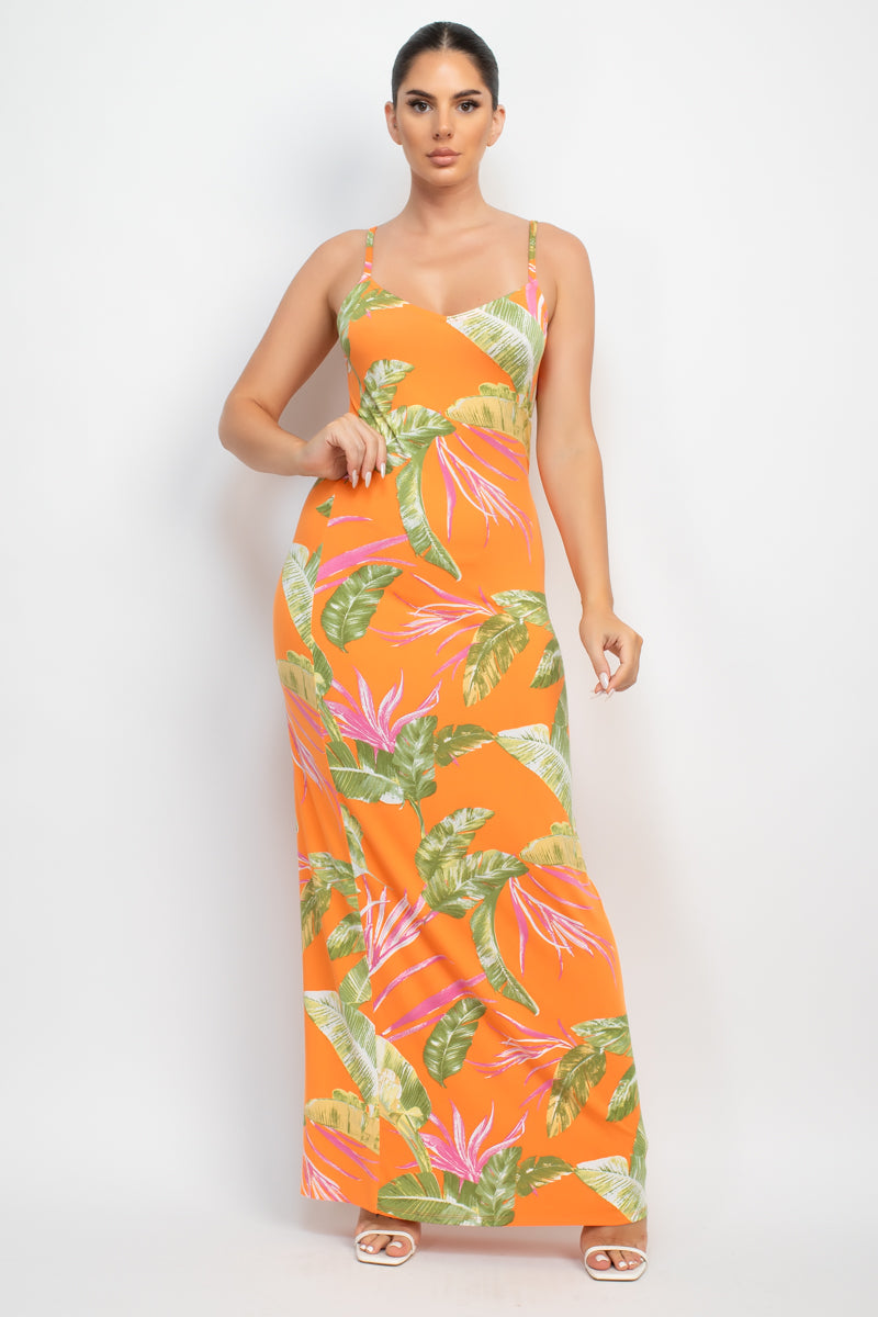 A vibrant orange maxi dress with a tropical print, featuring a scoop neckline and adjustable cami straps, perfect for summer outings.