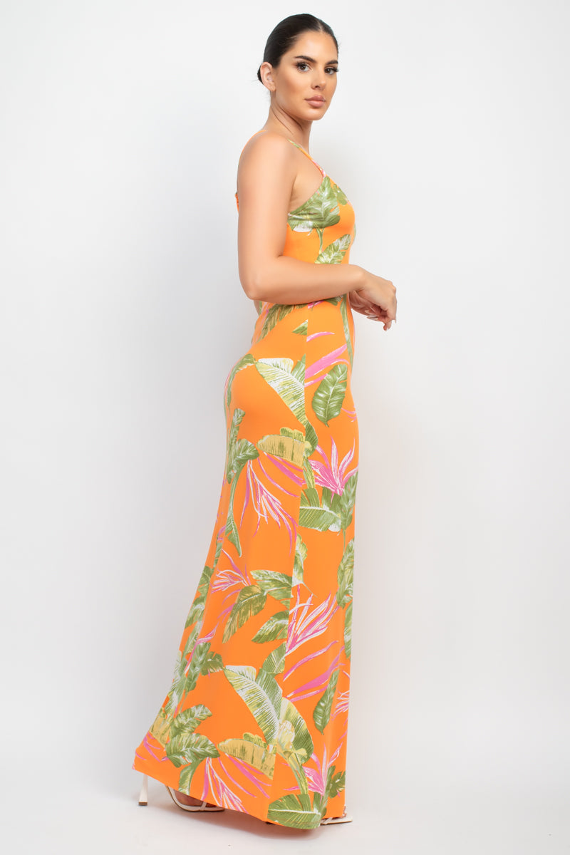 A vibrant orange maxi dress with a tropical print, featuring a scoop neckline and adjustable cami straps, perfect for summer outings.