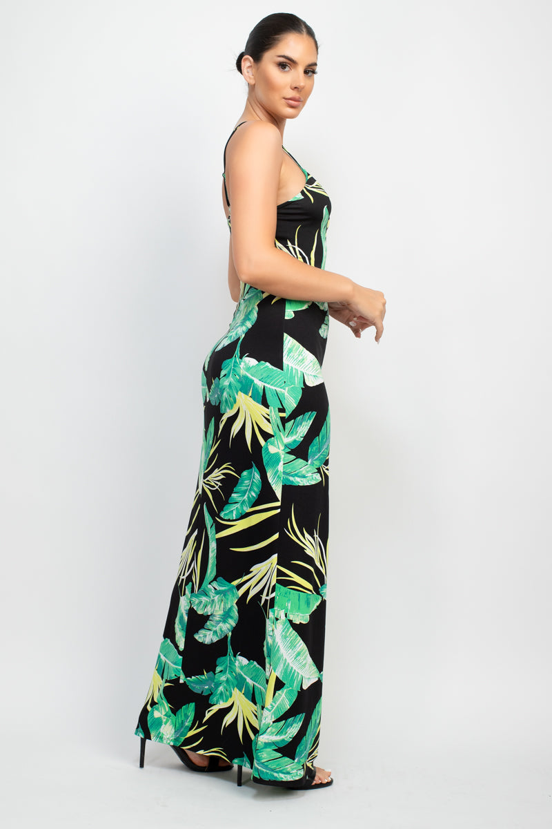 A stylish Scoop Tropical Print Maxi Dress featuring a vibrant tropical print, scoop neckline, and adjustable cami straps, perfect for summer outings.