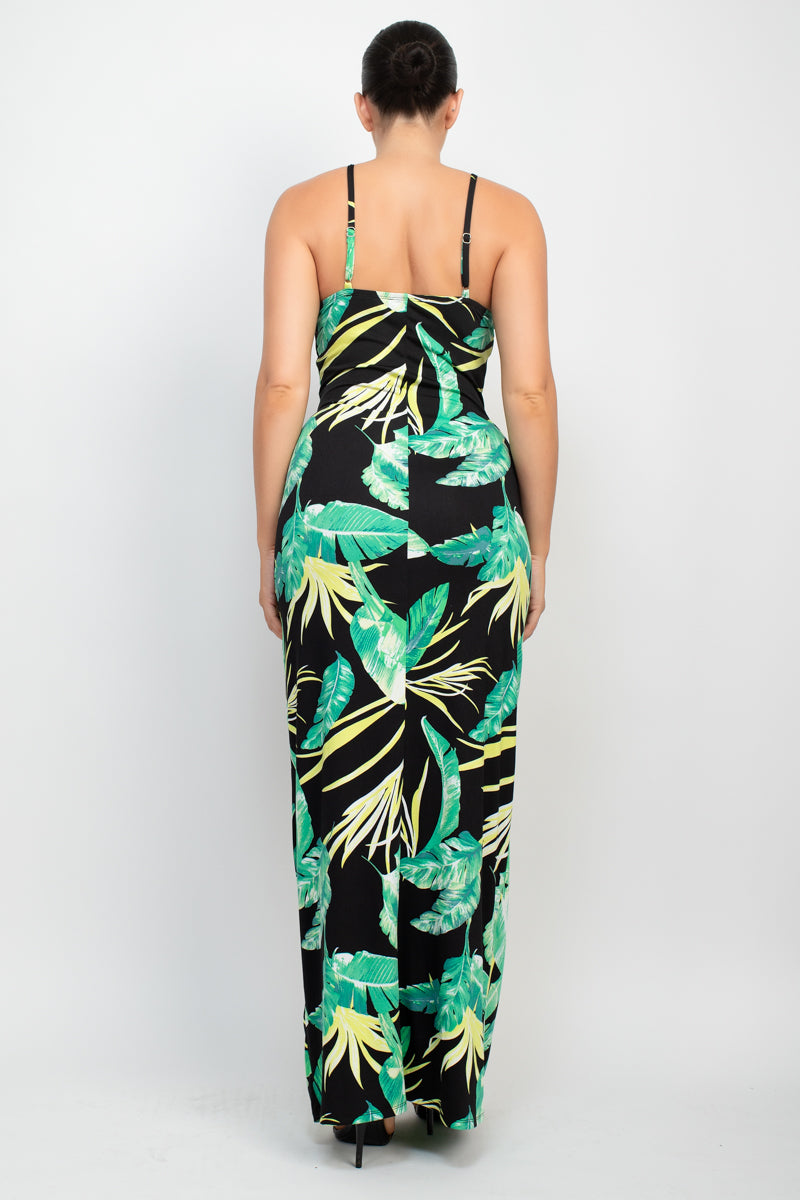 A stylish Scoop Tropical Print Maxi Dress featuring a vibrant tropical print, scoop neckline, and adjustable cami straps, perfect for summer outings.