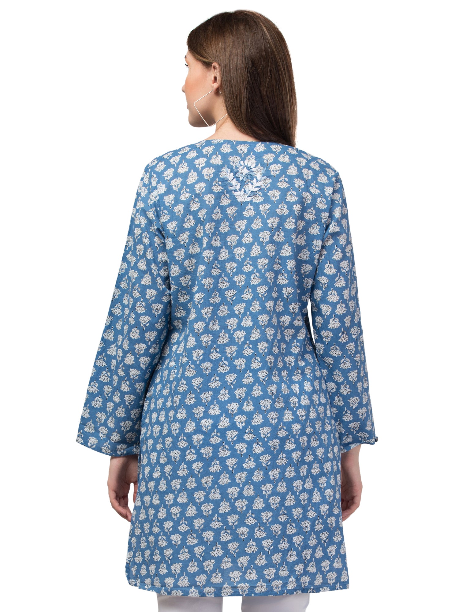 A stylish Sea Blue Tunic jacket made from lightweight Indian cotton, showcasing intricate craftsmanship and a vibrant color.