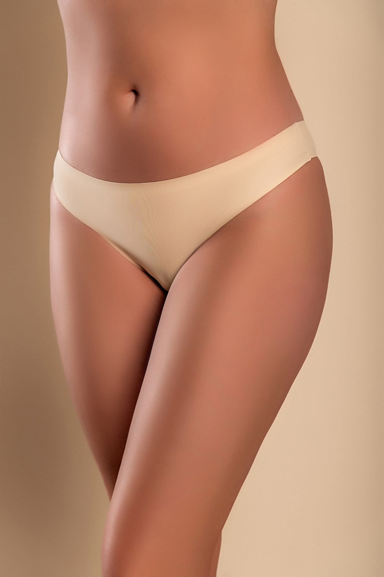 Beige seamless panty made from high-quality elastic fabric, showcasing its smooth design and comfort.