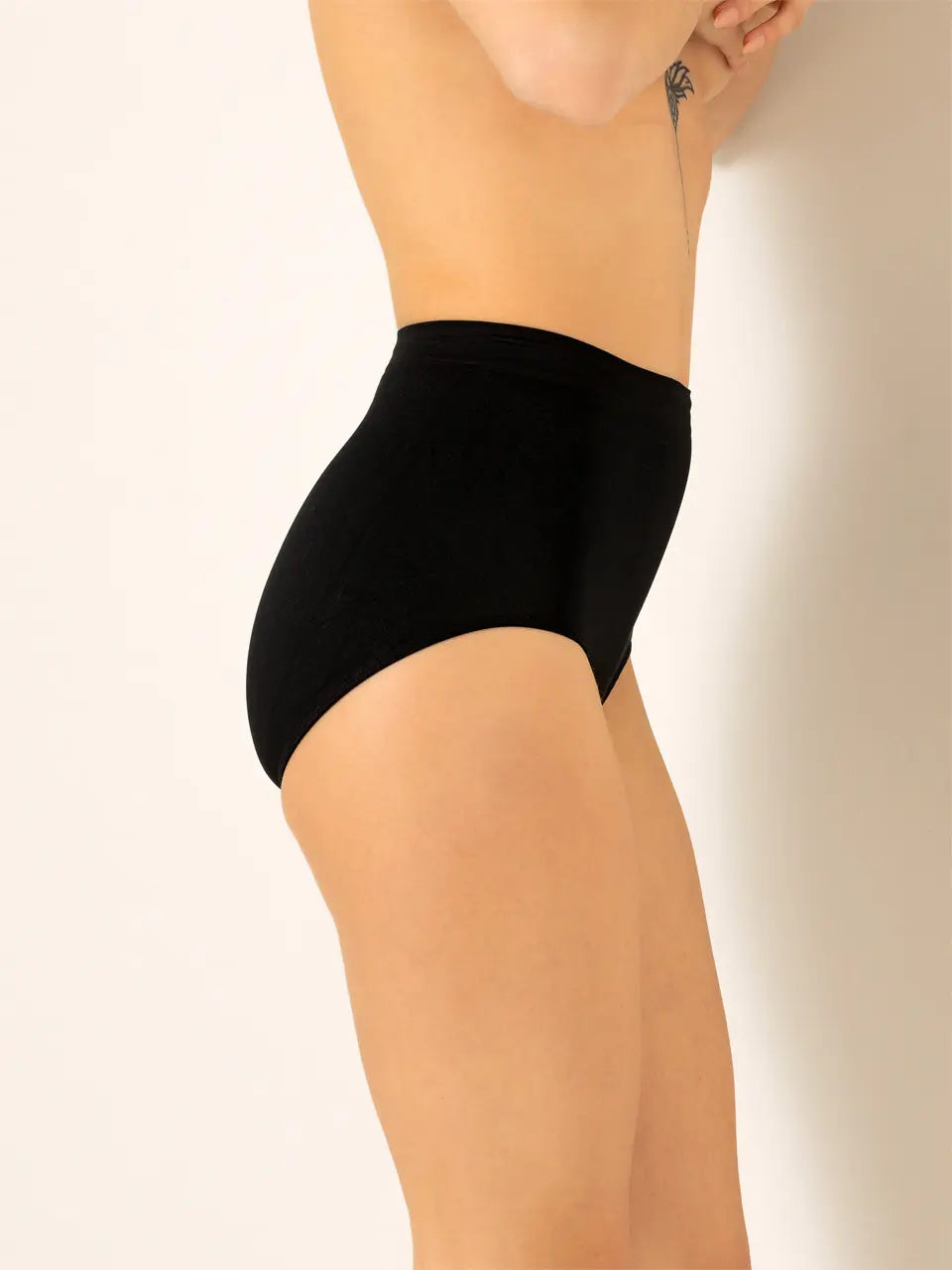 Seamless women's high waist panty in various colors, showcasing a smooth and comfortable design.