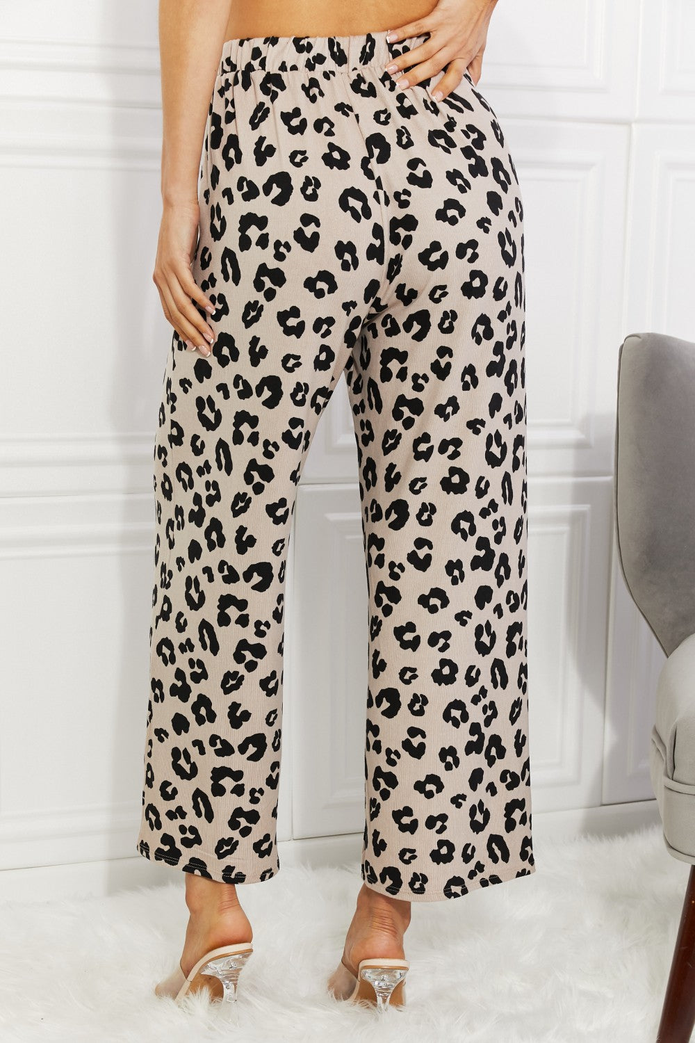 Seeing Spots Leopard Wide Leg Pants featuring a bold leopard print design, elastic waistband, and practical pockets, perfect for stylish comfort.