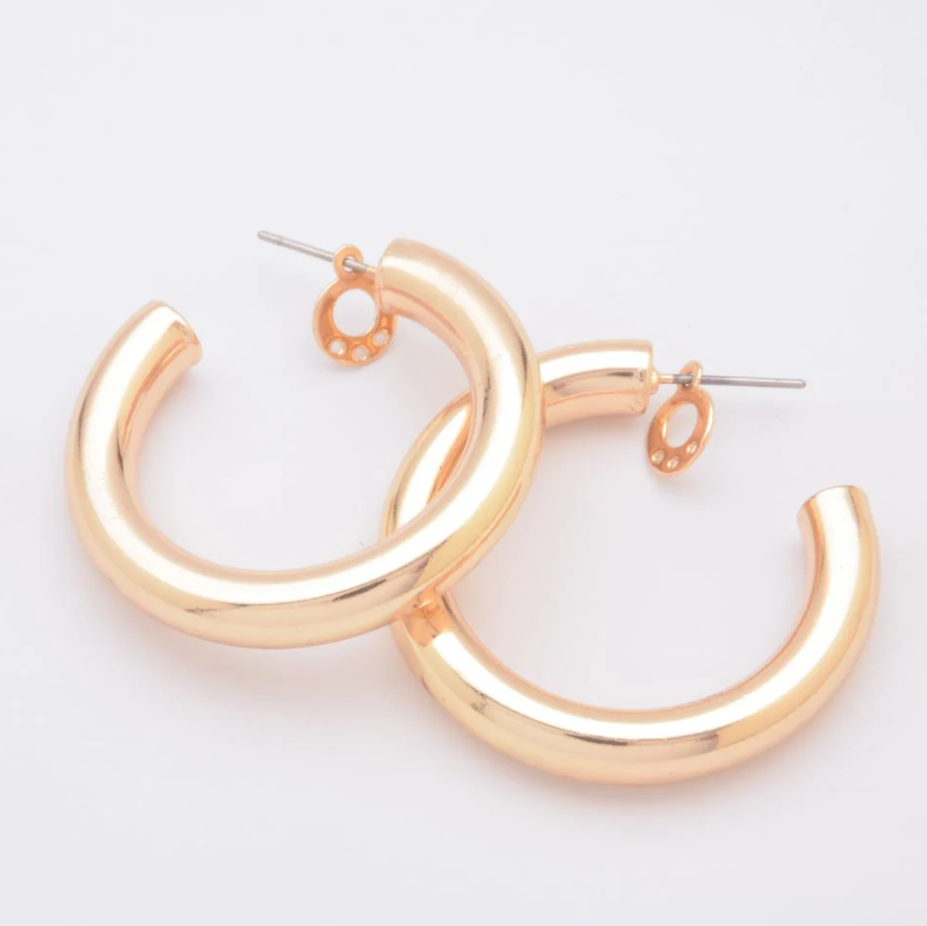 Elegant gold semicircular earrings, model ART594, crafted from 100% brass, nickel-free, perfect for enhancing any outfit.