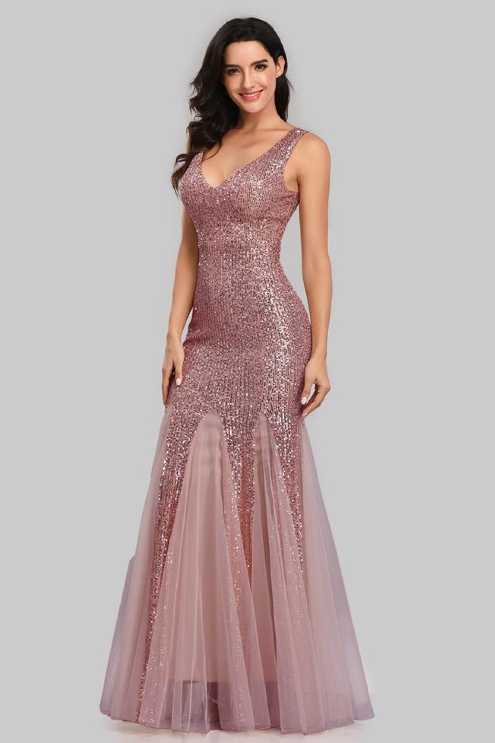 A glamorous Sequin Sleeveless Plunge Spliced Mesh Fishtail Dress featuring a V-neckline and a dramatic fishtail hem, perfect for evening events.