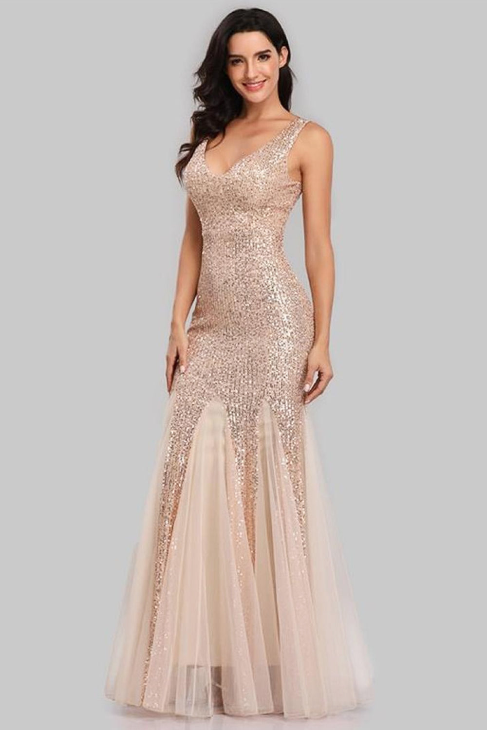 A glamorous Sequin Sleeveless Plunge Spliced Mesh Fishtail Dress featuring a V-neckline and a dramatic fishtail hem, perfect for evening events.