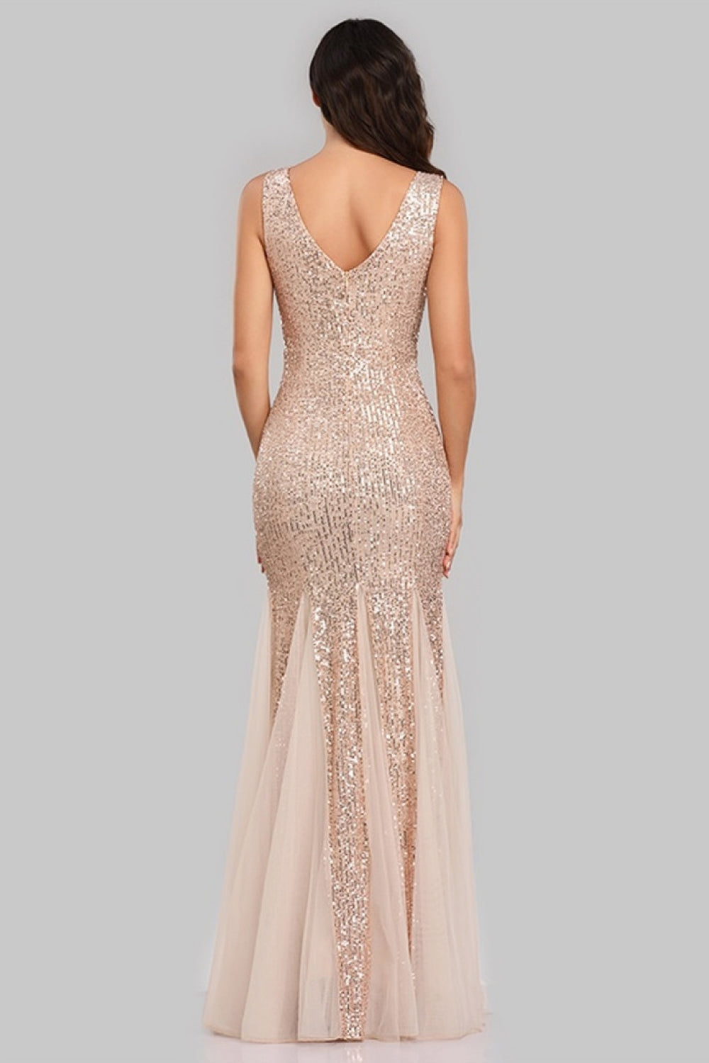 A glamorous Sequin Sleeveless Plunge Spliced Mesh Fishtail Dress featuring a V-neckline and a dramatic fishtail hem, perfect for evening events.