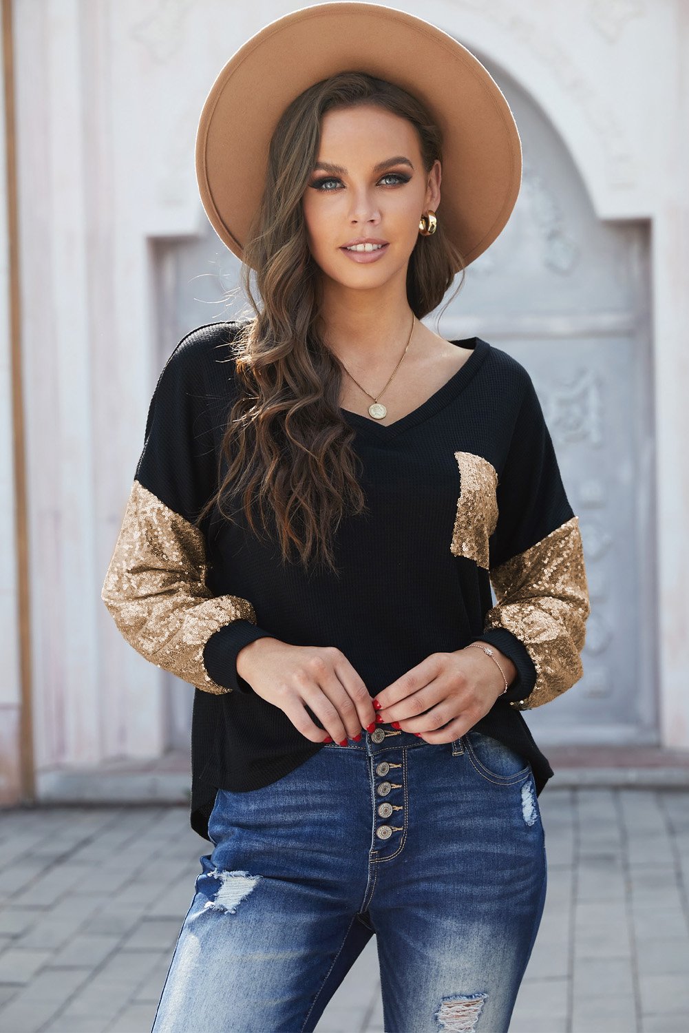 A stylish Sequin Splicing V Neck Bishop Sleeves Top featuring shimmering sequins on bishop sleeves and a fashionable sequined pocket.