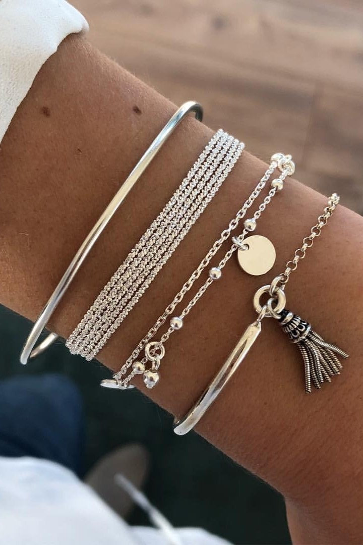 Wrist with stylish silver bracelets