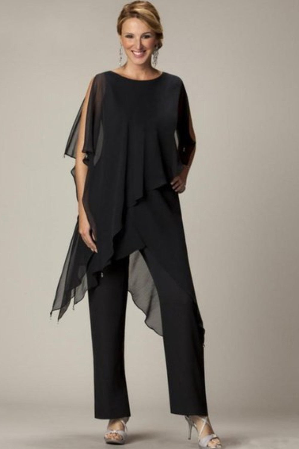 Elegant black translucent tunic and long pants set, showcasing a loose fit and round collar, perfect for stylish occasions.