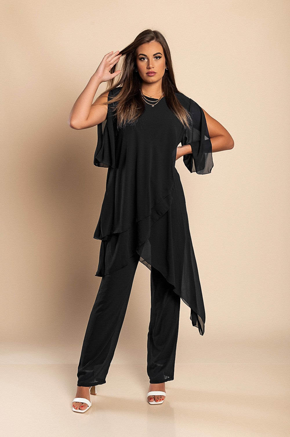 Elegant black translucent tunic and long pants set, showcasing a loose fit and round collar, perfect for stylish occasions.