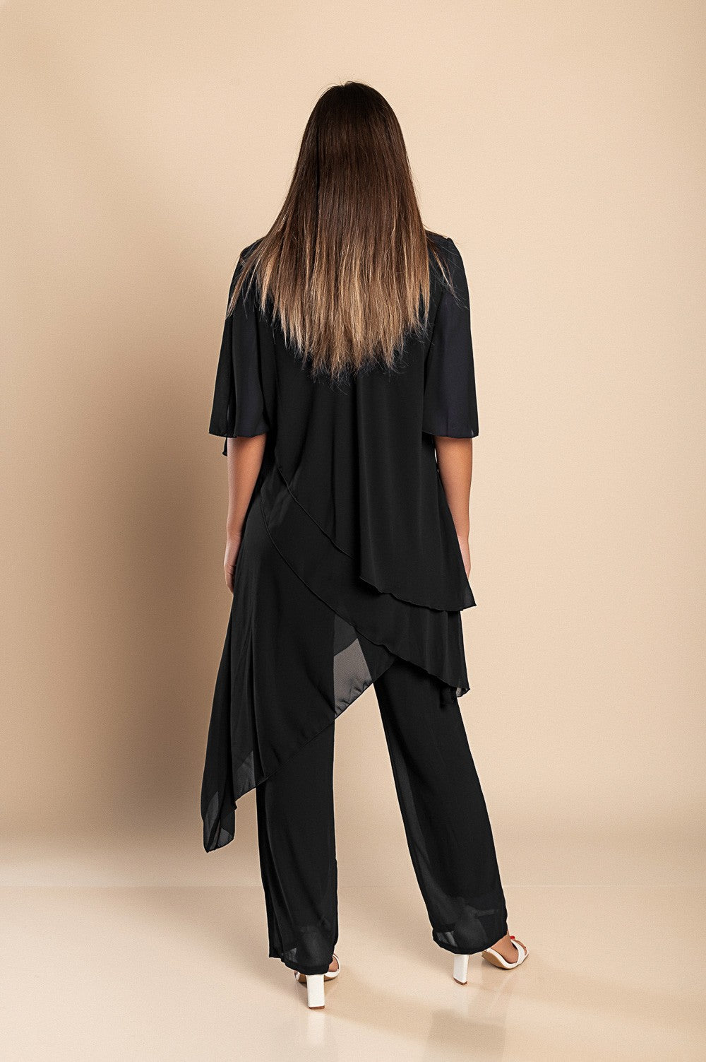 Elegant black translucent tunic and long pants set, showcasing a loose fit and round collar, perfect for stylish occasions.