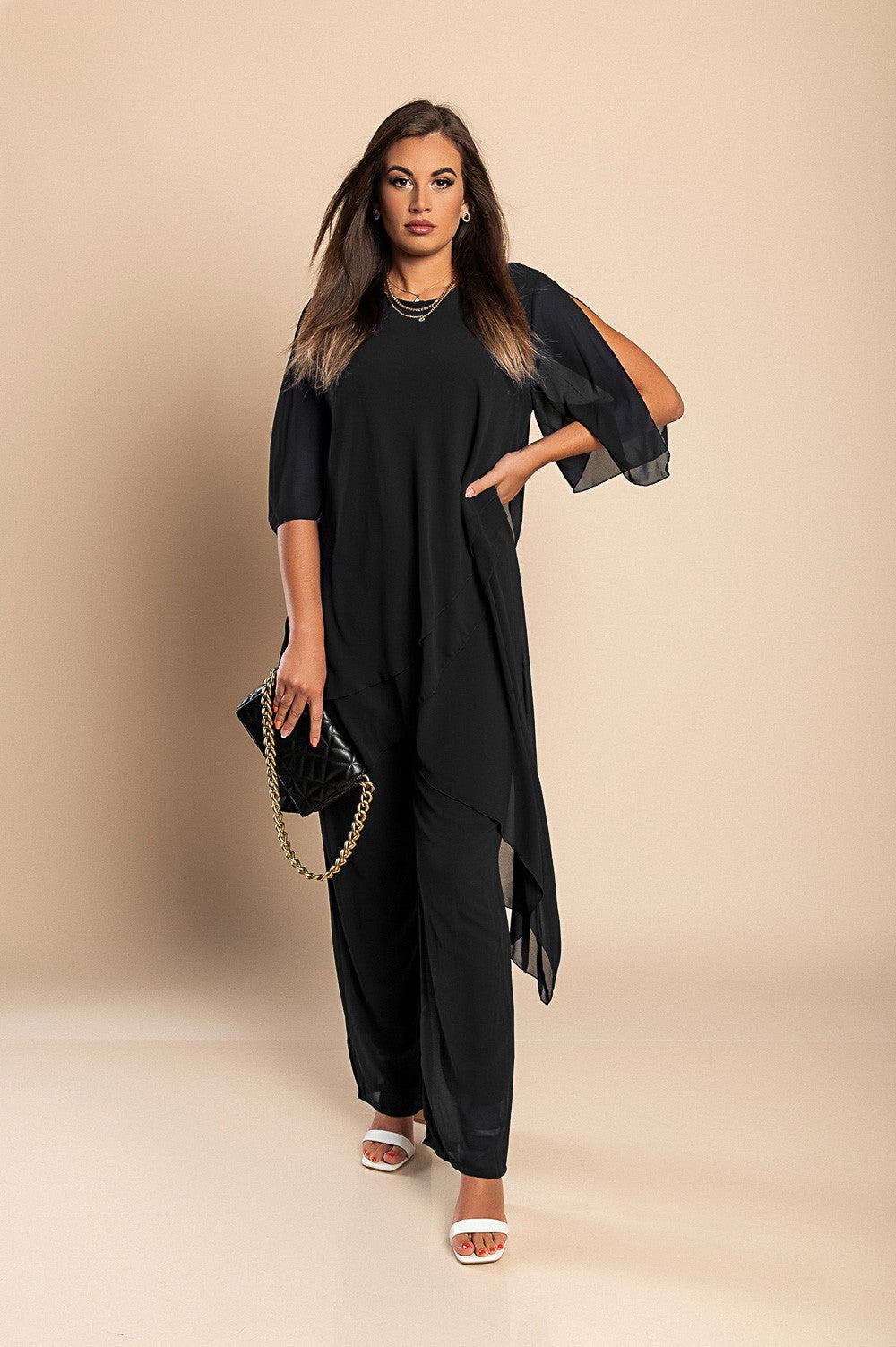 Elegant black translucent tunic and long pants set, showcasing a loose fit and round collar, perfect for stylish occasions.