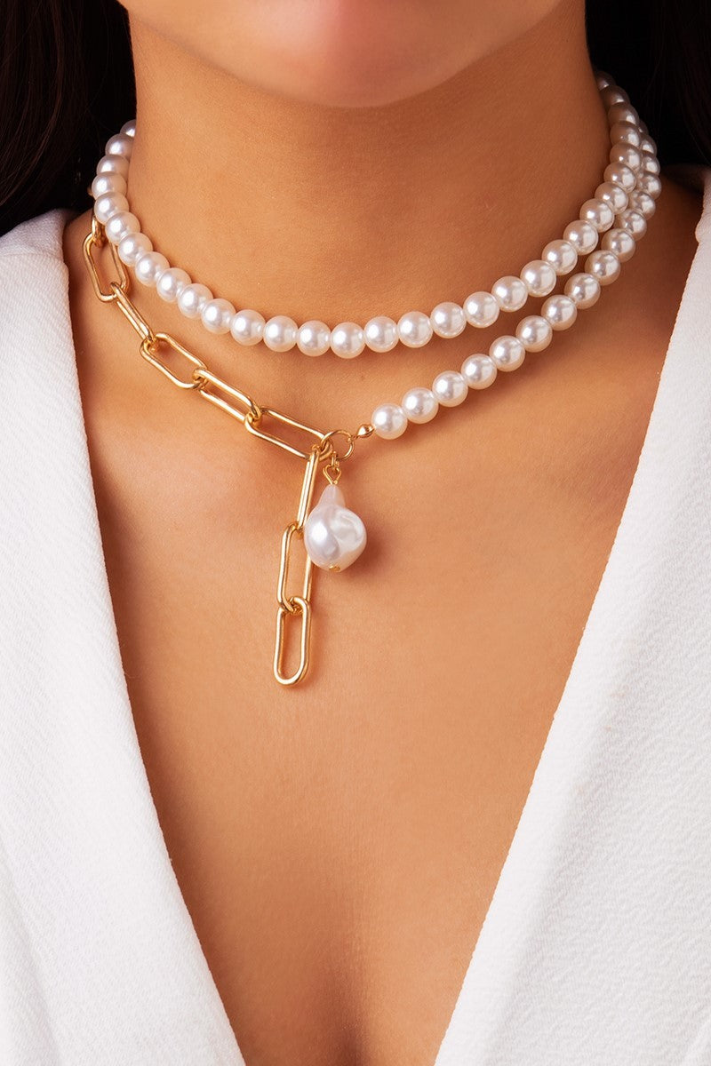 Set of two elegant gold necklaces featuring imitation pearls and a metal lobster clasp closure.