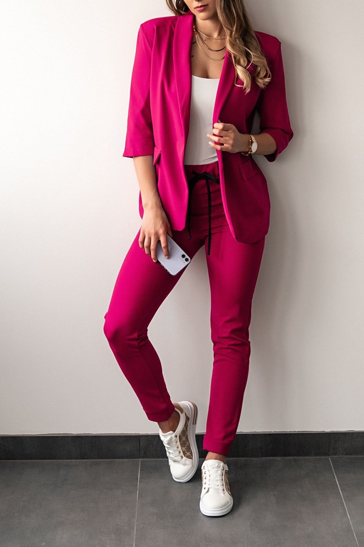 Fuchsia set pants with blazer featuring 3/4 sleeves, showcasing elegant design and comfortable fit.