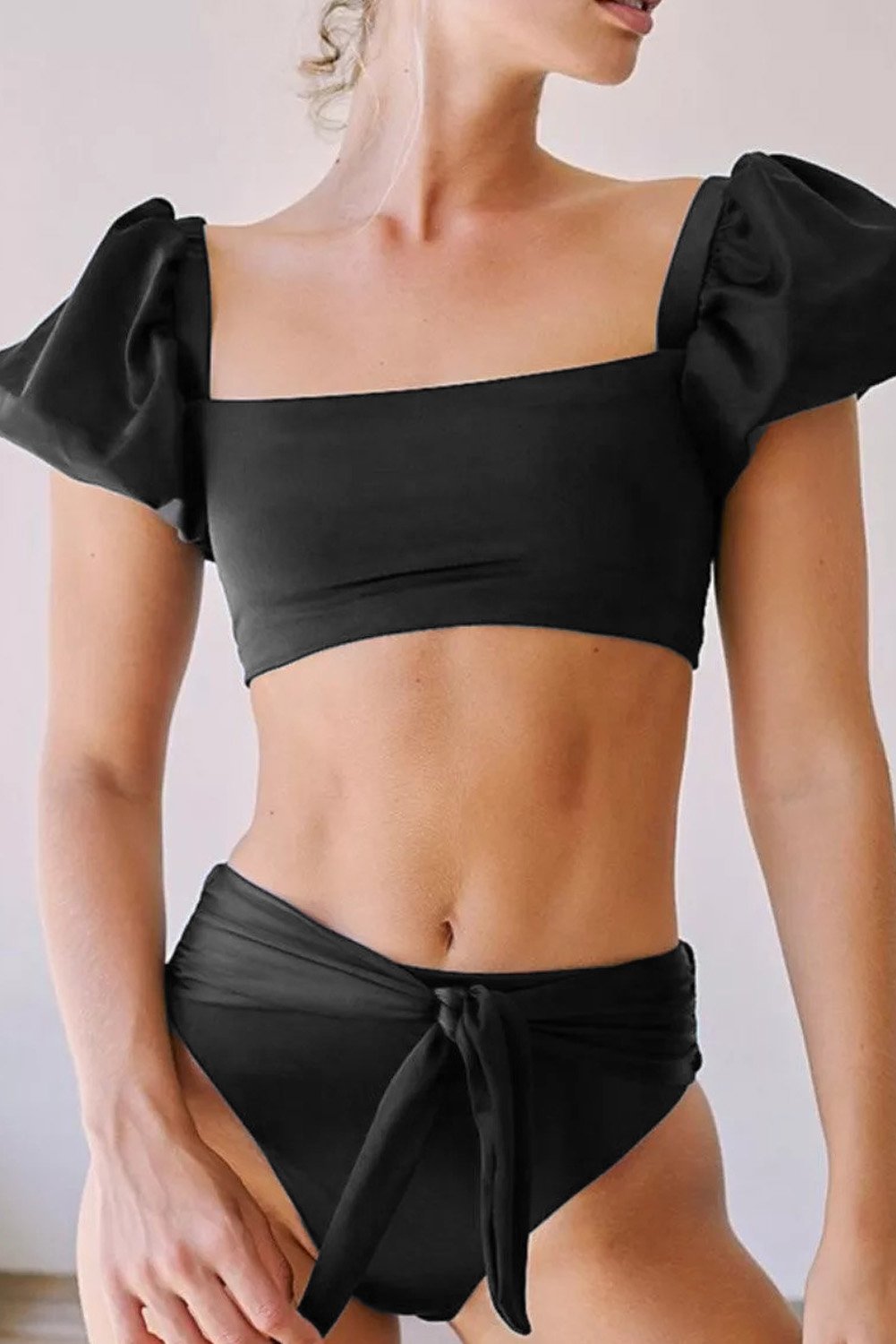 A stylish Sexy Bubble Sleeves High Waist Bikini featuring elegant puff sleeves, a U-shaped backless design, and a flattering high waist panty, perfect for beach vacations.