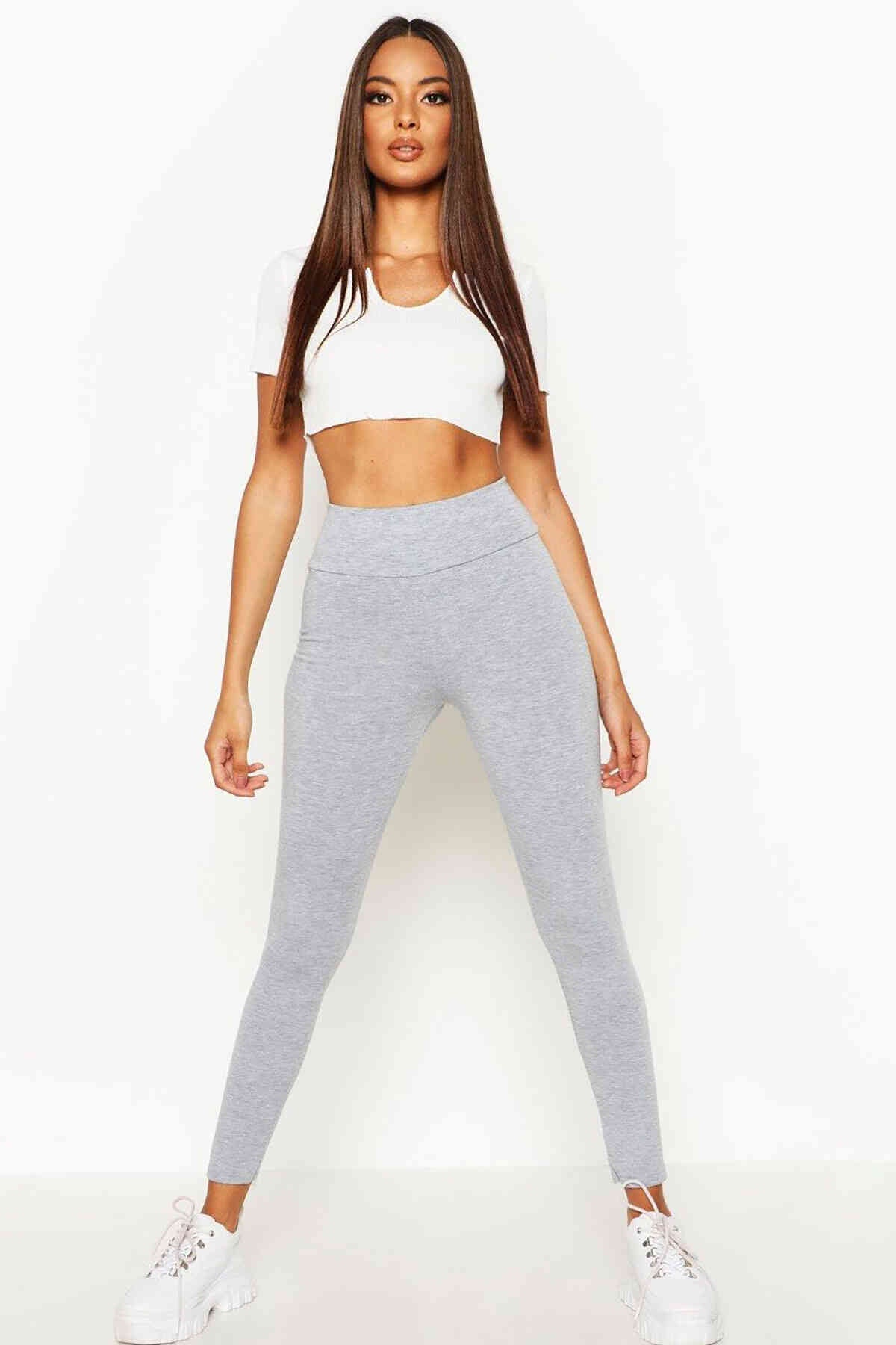 A pair of sexy high waist grey leggings designed for women, showcasing a flattering fit and soft fabric.