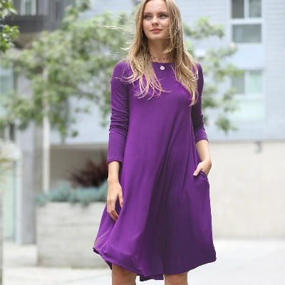 A stylish Sexy Signature Side-pocket Dress featuring long sleeves, side pockets, and a flattering fit, perfect for fall and winter wear.