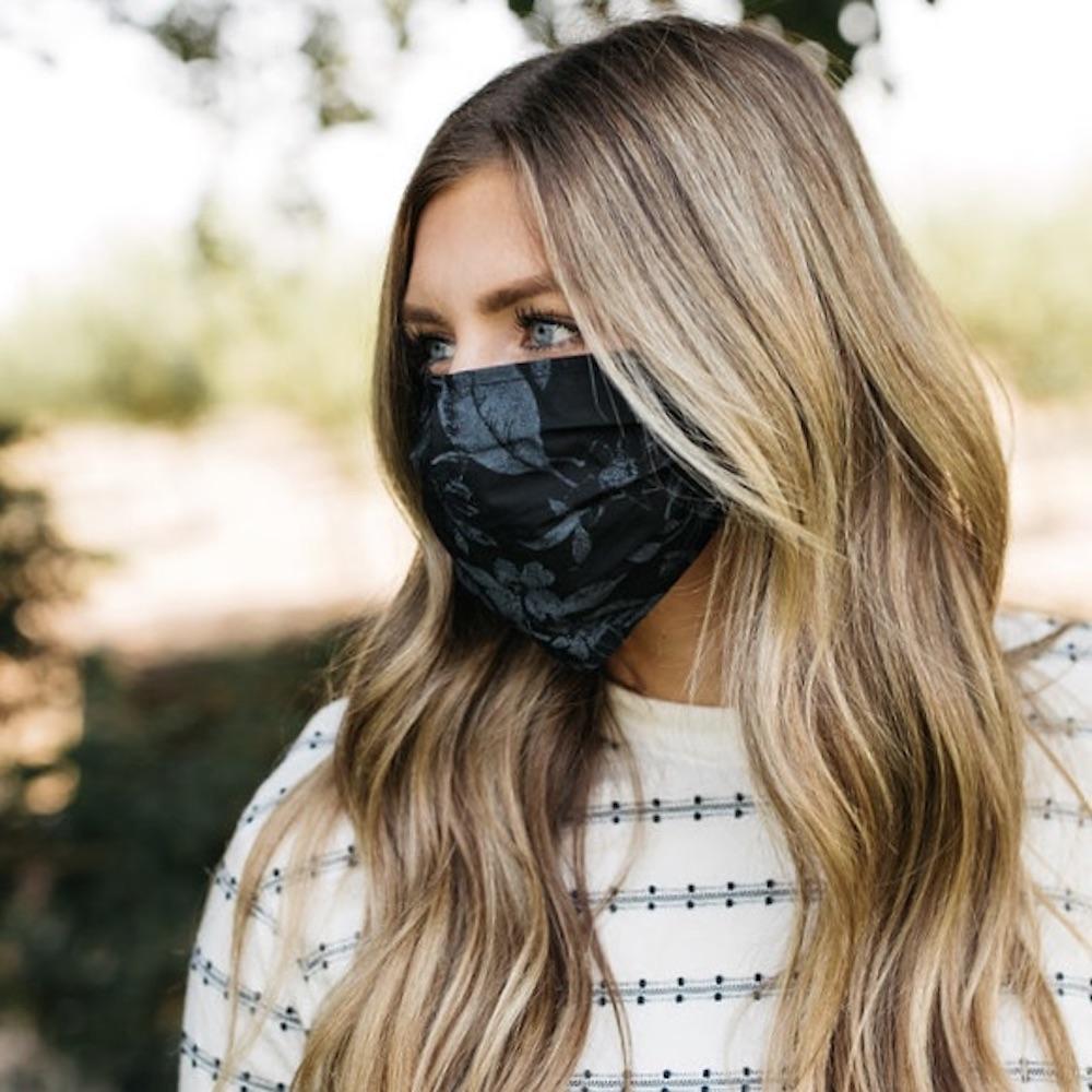 Shadow Floral Face Mask made of breathable cotton with floral design, featuring pleats for comfort and a pocket for filter insertion.