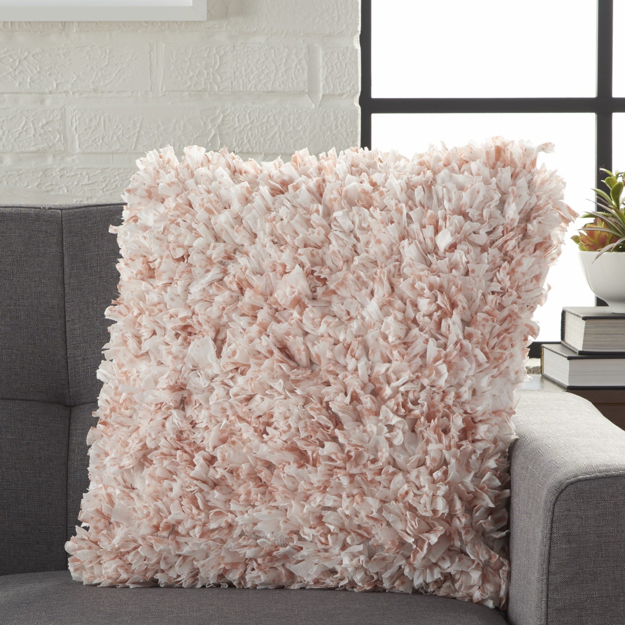 Shaggy Chic Blush and Ivory Throw Pillow with textured design, showcasing pastel colors and plush material.