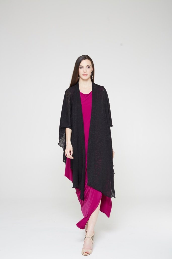 A stylish and versatile Shawl made from a soft fabric blend, perfect for layering and enhancing outfits.