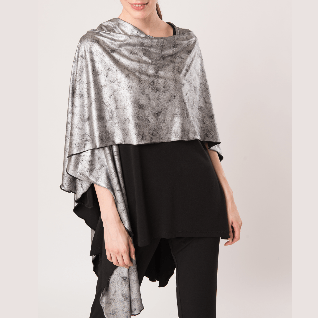 A stylish Shawl Platinum made of faux liquid leather, showcasing its reversible design and luxurious texture.